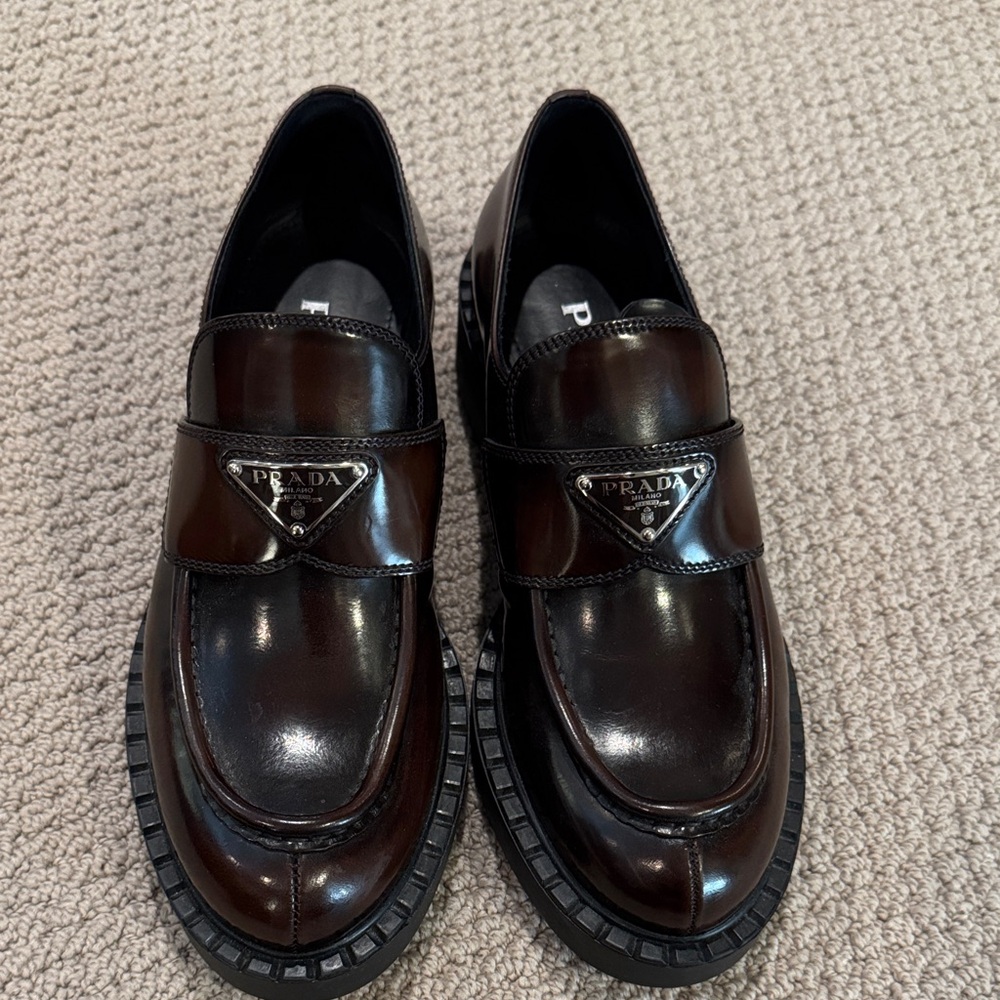 Prada womens Dark Brown Loafers
Size 8 1/2